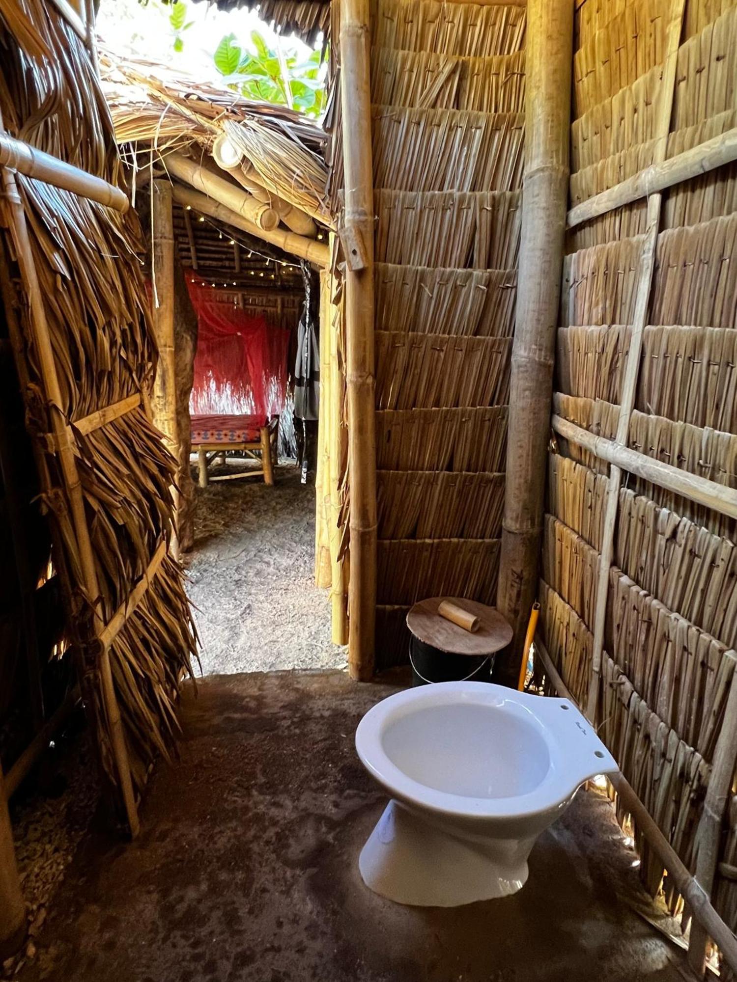 Albergue Tribal Huts Community Daanbantayan Habitación foto