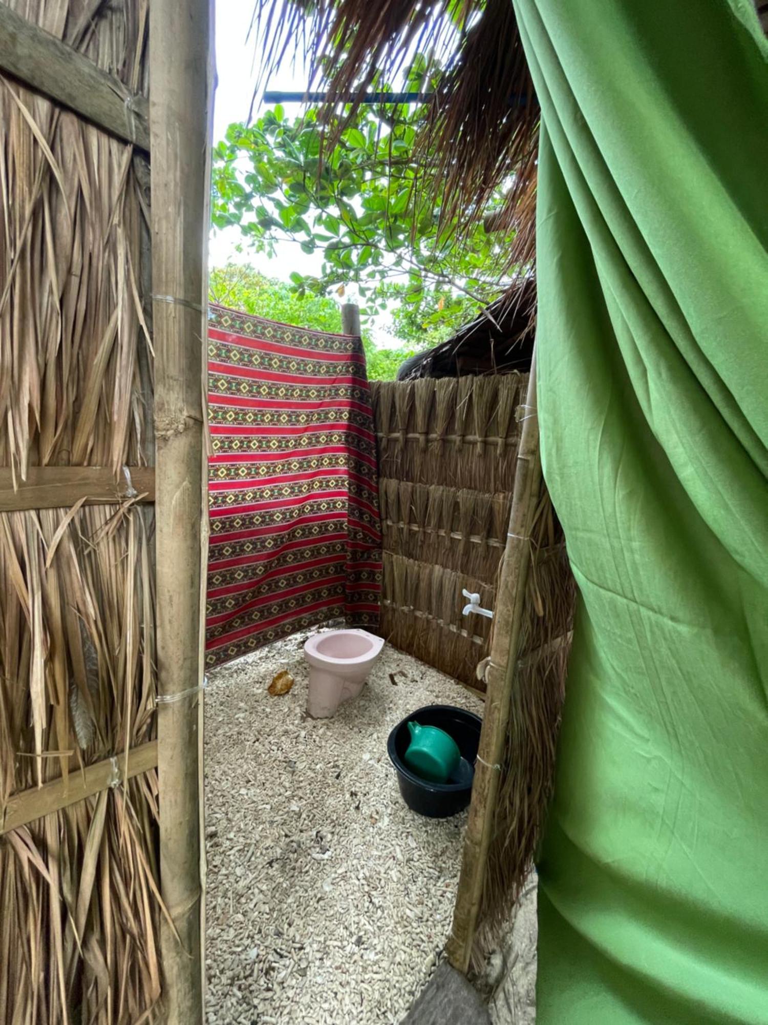 Albergue Tribal Huts Community Daanbantayan Habitación foto
